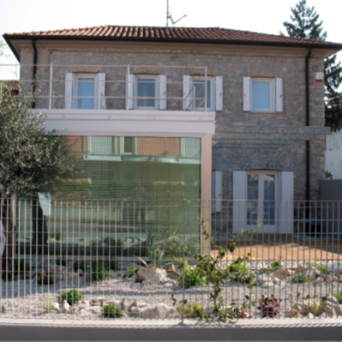 Villa unifamiliare - restauro casolare carsico e ampliamento